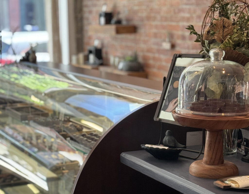 display cases inside taverniers cozy downtown brattleboro chocolate shop